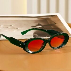 Stylish Green Sunglasses with Red Lenses